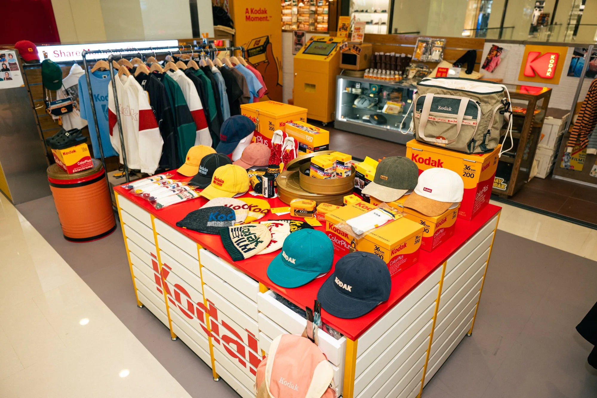 KODAK Apparel caps, bags and clothing displayed at the Harbour City pop-up